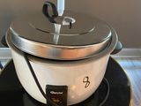 a crock pot sitting on top of a table