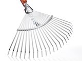 a close up of a metal rake on a white background