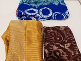 three different types of cloths sitting on a table