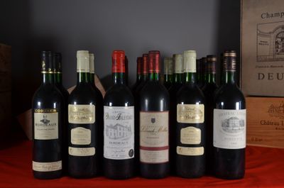 several bottles of wine are lined up on a table