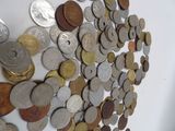 a lot of coins that are on the wall