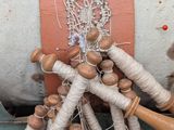 a close up of a bunch of wooden baseball bats