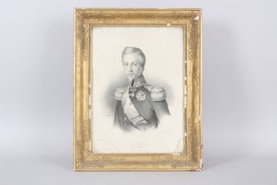 an old picture of a man in uniform in a gold frame