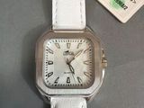 an image of a close up of a wrist watch on a table