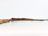 a rifle with a wooden barrel on a white background
