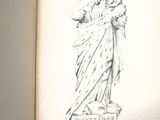 un livre sur lequel figure le dessin d'une femme tenant un enfant dans ses bras