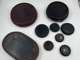a white box with some black and brown items in it