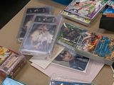 a table with a lot of cards and dvds on it