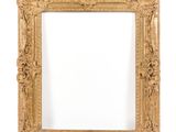 an antique gold frame with a decorative pattern on the edges