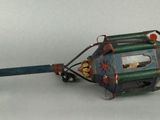 a toy fishing rod with a clock attached to it
