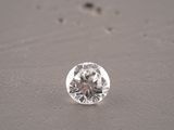 a close up of a diamond on a table