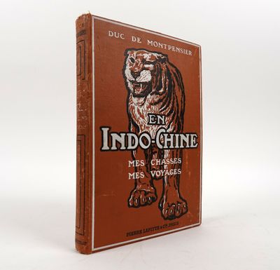 un vieux livre sur lequel figure l'image d'un tigre