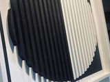 a picture of a black and white painting on a wall