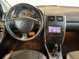 the interior of a car with a steering wheel, dashboard, and dash board