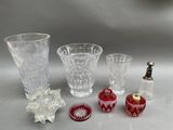 a lot of glass items that are sitting on a table