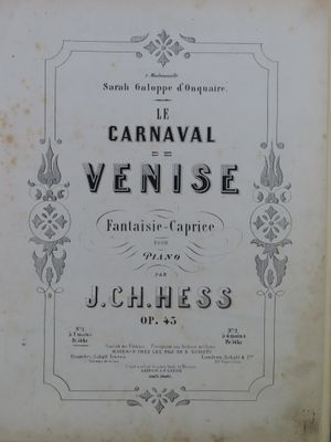 un vieux livre sur lequel est représenté un carnaval de Venise