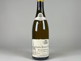 an image of a bottle of wine sitting on top of a table