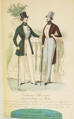 two men in formal clothing standing next to each other on a balcony