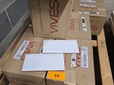 plusieurs boîtes empilées sur une palette