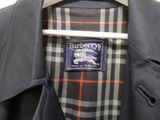 a close up of a suit on a hanger