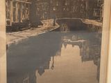 a picture of a picture of a canal in the middle of the picture