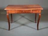 an image of a wooden desk with a drawer on it
