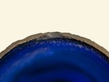 a close up of a blue agate on a white background
