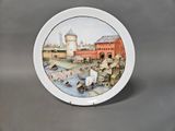 a plate with a picture of a castle on it
