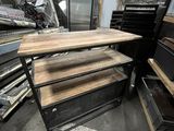 a lot of shelves that are stacked up in a room