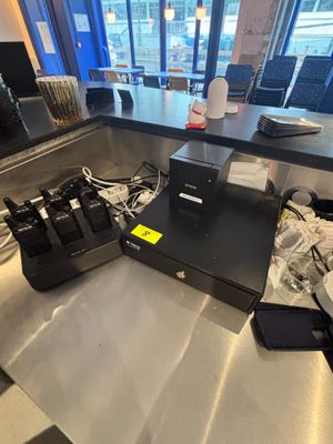 a machine that is sitting on a counter in a restaurant