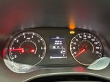 a close up of a car dashboard with a speedometer