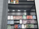a display case with a lot of stamps on it