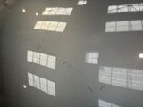 many windows in the building that are lit by the sun