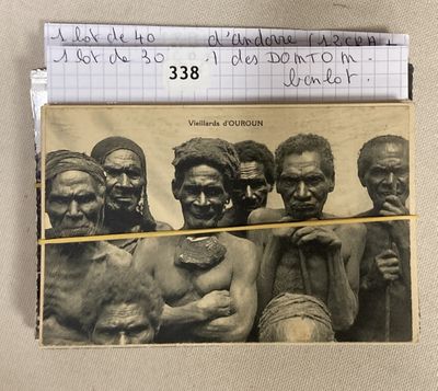 an old photo of a group of men with tattoos on their faces