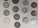a lot of coins that are sitting on a table