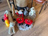 a lot of stuffed animals that are on the floor