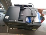 a printer that is sitting on top of a table