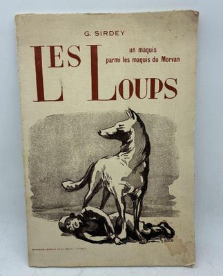 un vieux livre avec le dessin d'un chien sur la couverture