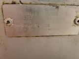 a close up of a metal plate on the side of a refrigerator