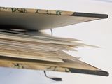 a close up of an open book on a table