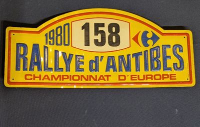 an image of a yellow and blue sign that says rallye d ' antibes champion of europe