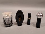 a bottle of perfume, a bottle of perfume and a bottle of perfume
