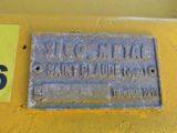 a sign on the side of a yellow truck