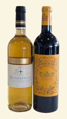 two bottles of wine sitting next to each other on a table