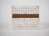 an image of a clear glass box with a wooden handle