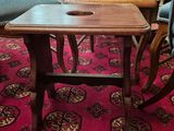 a wooden table with a wooden seat and a wooden table with a wooden table top