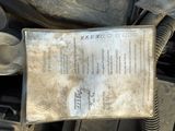 the engine of a car is dirty and needs to be repaired