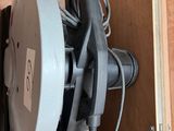 a machine that is sitting inside of a wooden box