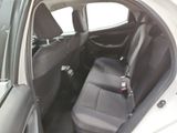 the back seats of a car with a seat belt in the back