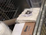 a cart full of plastic bags and a bag of toilet paper